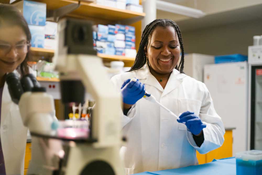 Photo of UMMC researcher in a lab setting