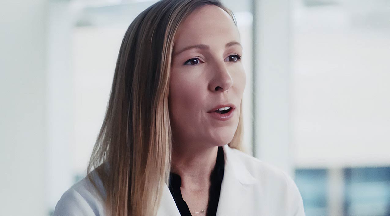 Doctor speaking to camera